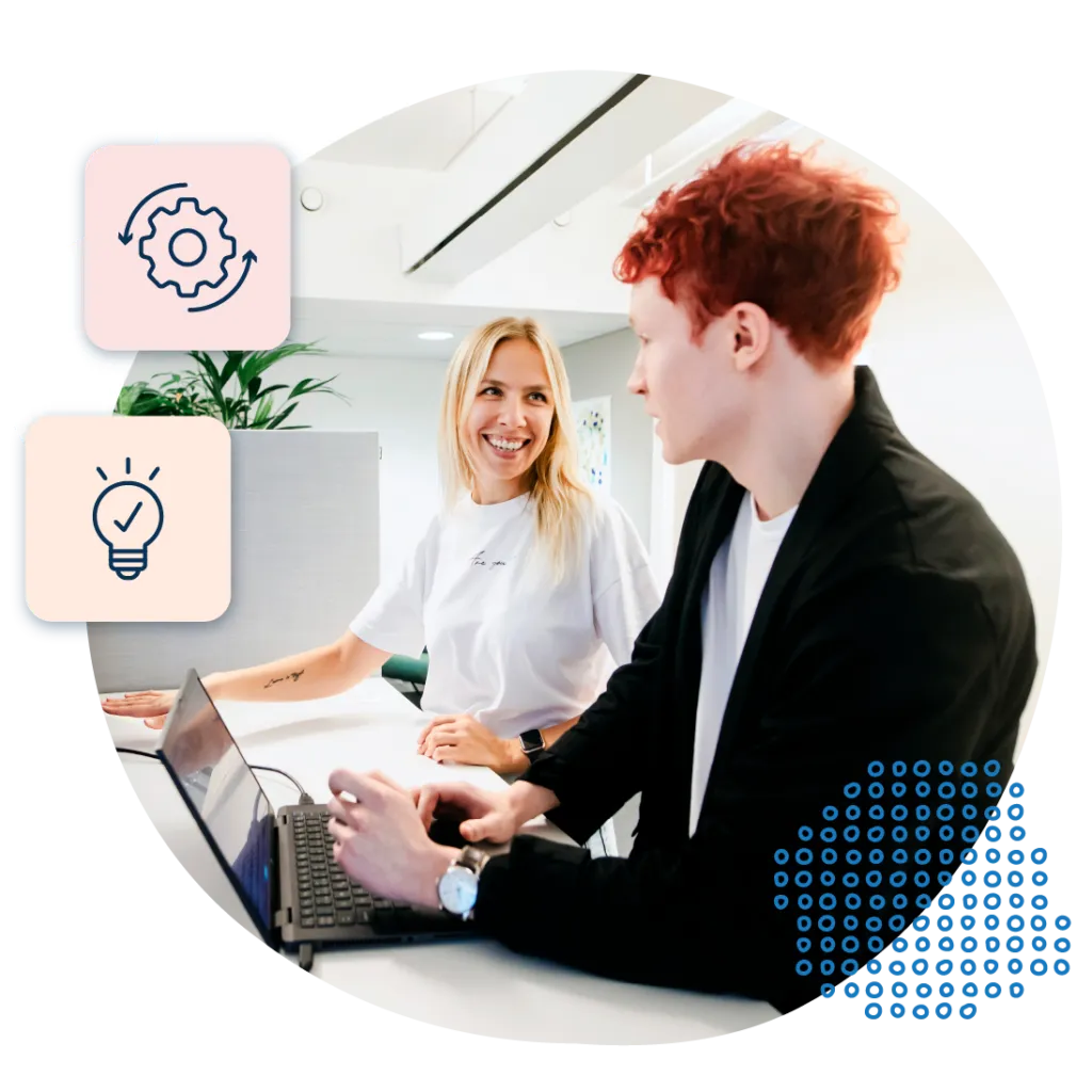 An image showing two workers at a laptop, enhanced with icons of a cog and lightbulb.